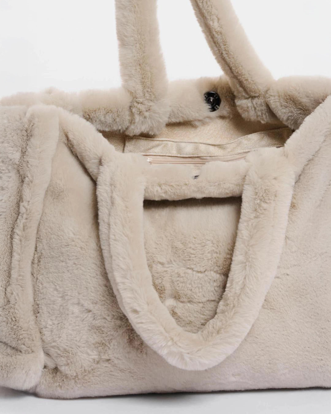 Beige faux fur bag in beige colour