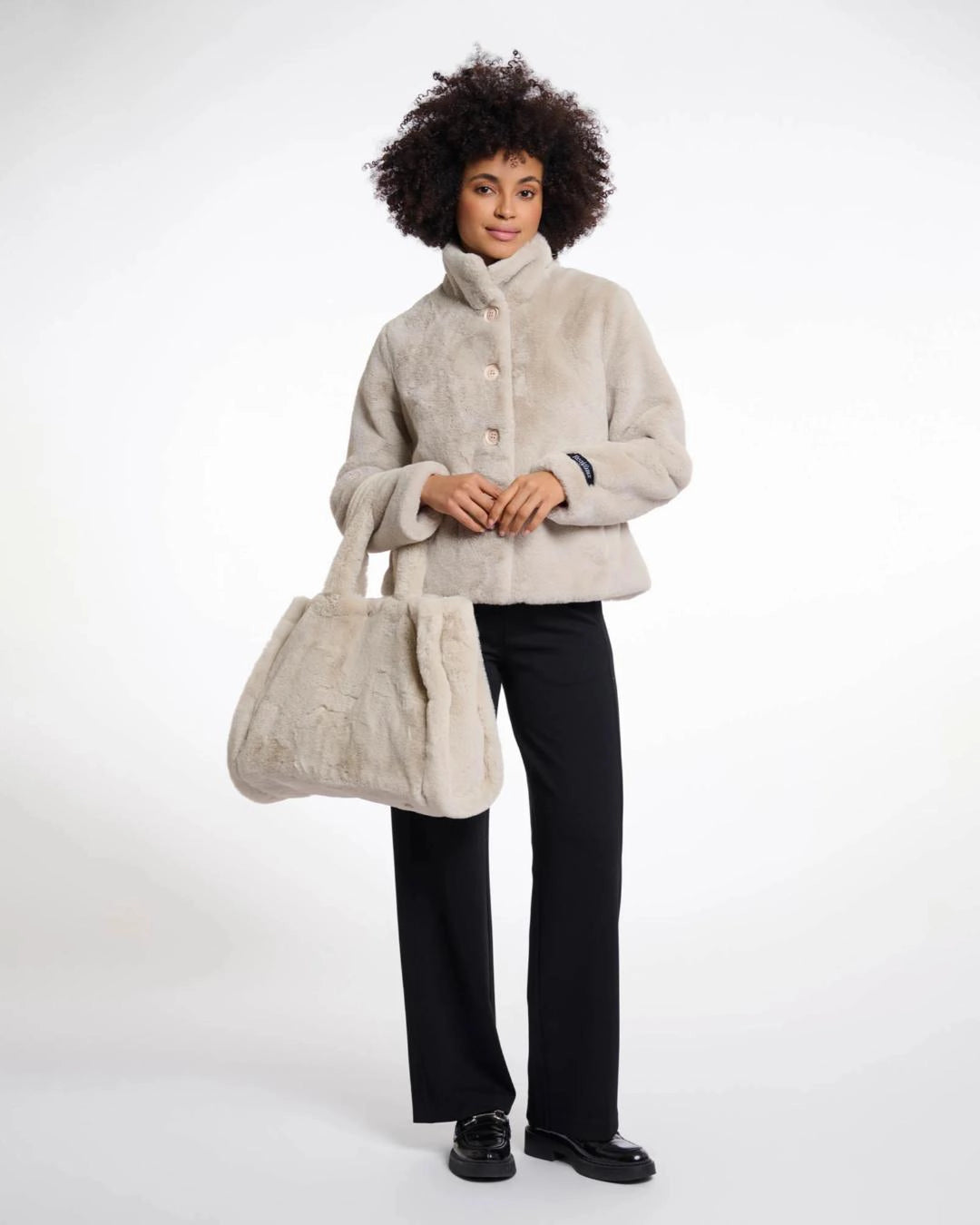 Beige faux fur bag in beige colour
