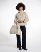 Beige faux fur bag in beige colour