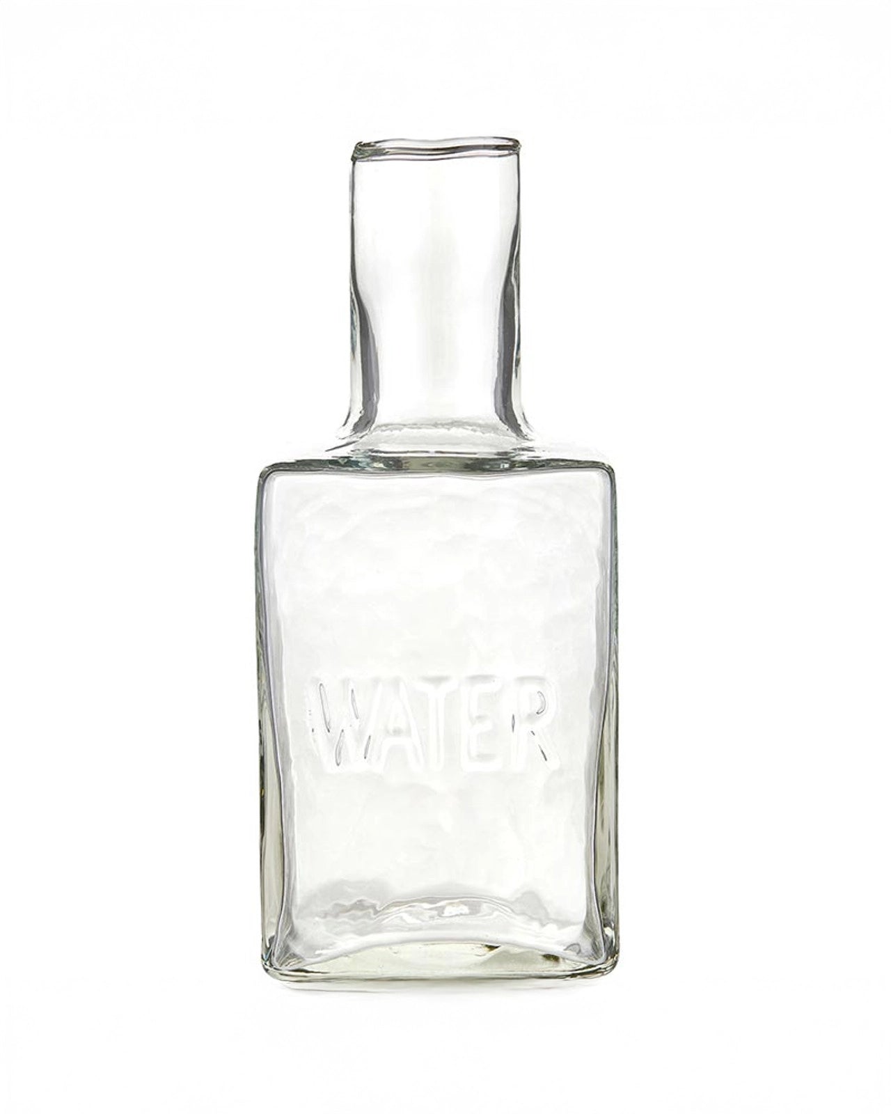a picture of a glass water decanter with a cup that acts as a lid