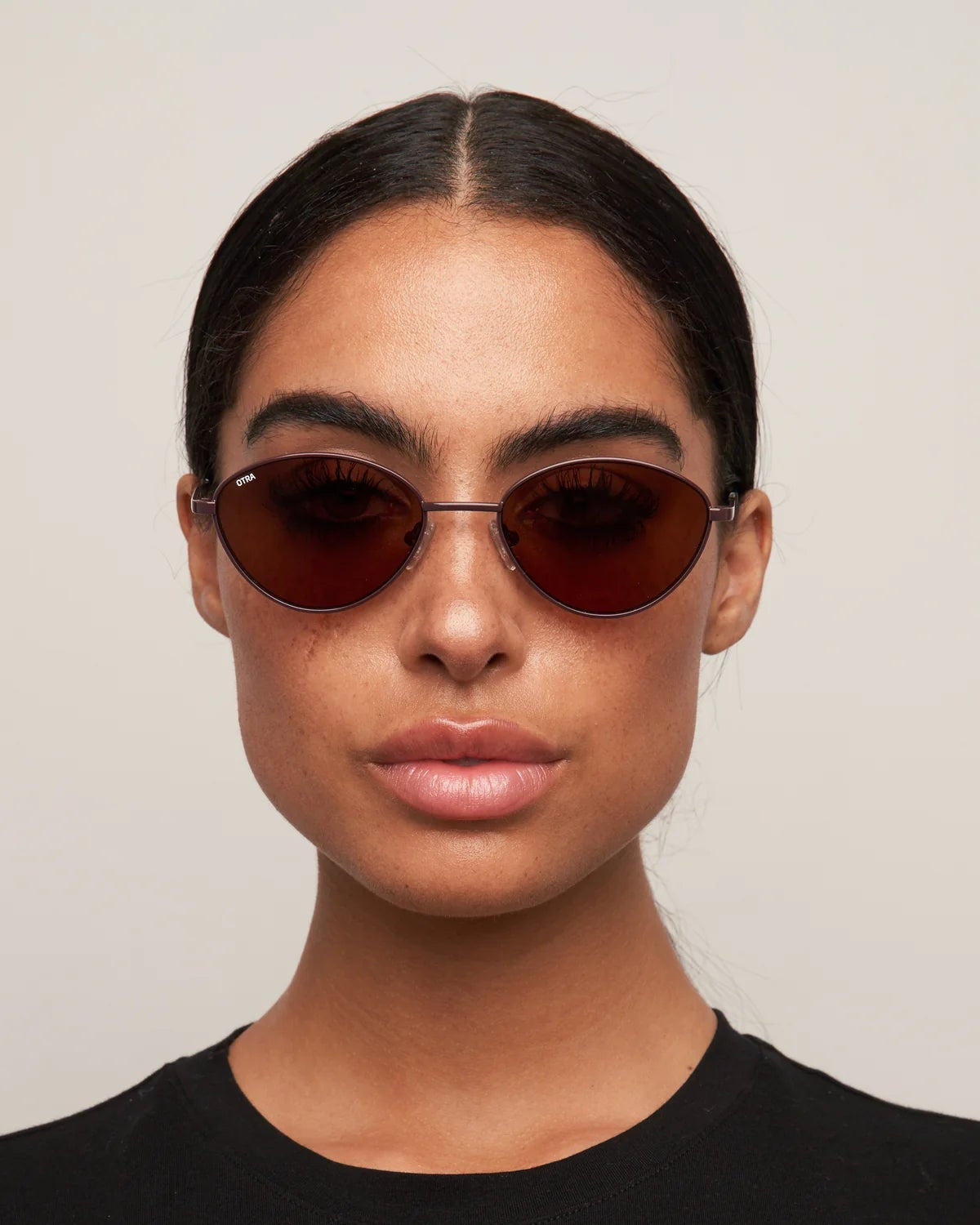 oval brown sunglasses with thin frame