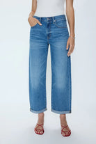 blue wide leg denim pant with a rolled hem