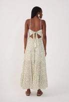 maxi dress in white with green leaves all over