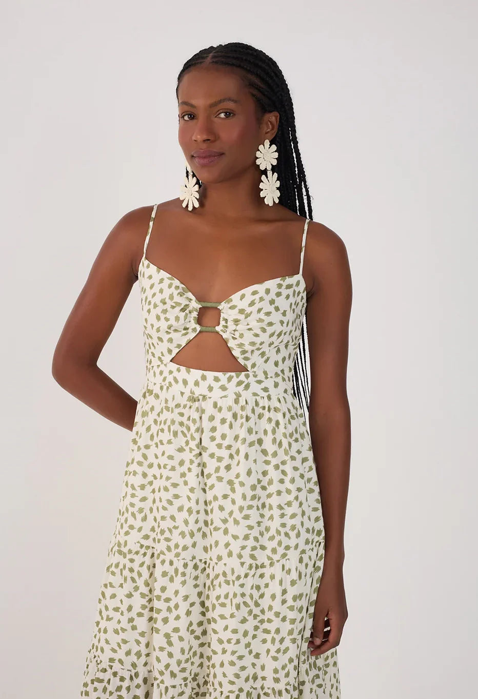maxi dress in white with green leaves all over