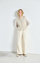 sleeveless vest in cream