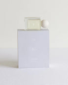 Clear perfume bottle with white cap and 'Bo' writing on it with 'Liis' branding