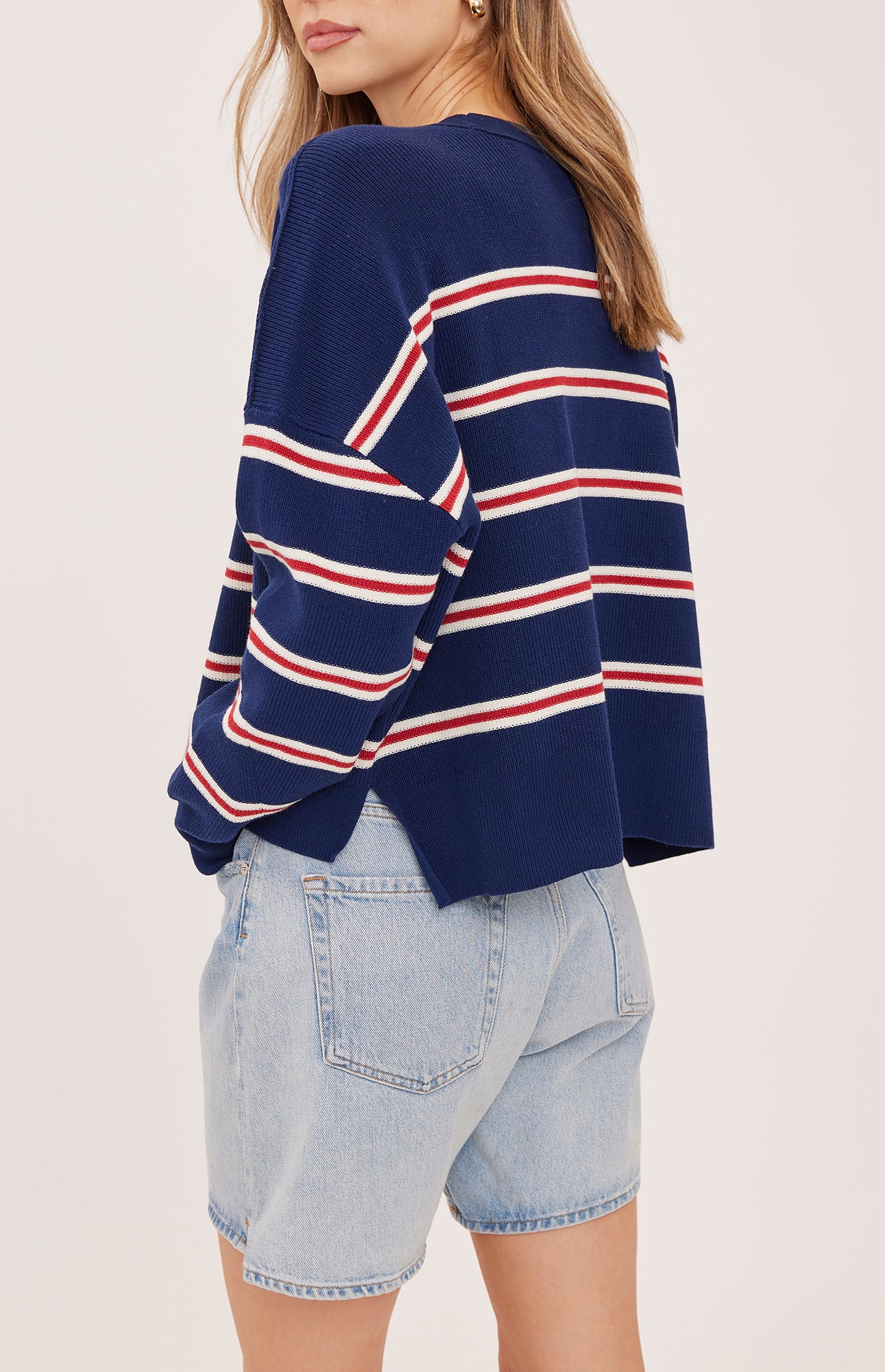 navy sweater with red and white stripes