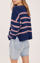 navy sweater with red and white stripes