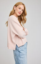 light pink crew neck sweater