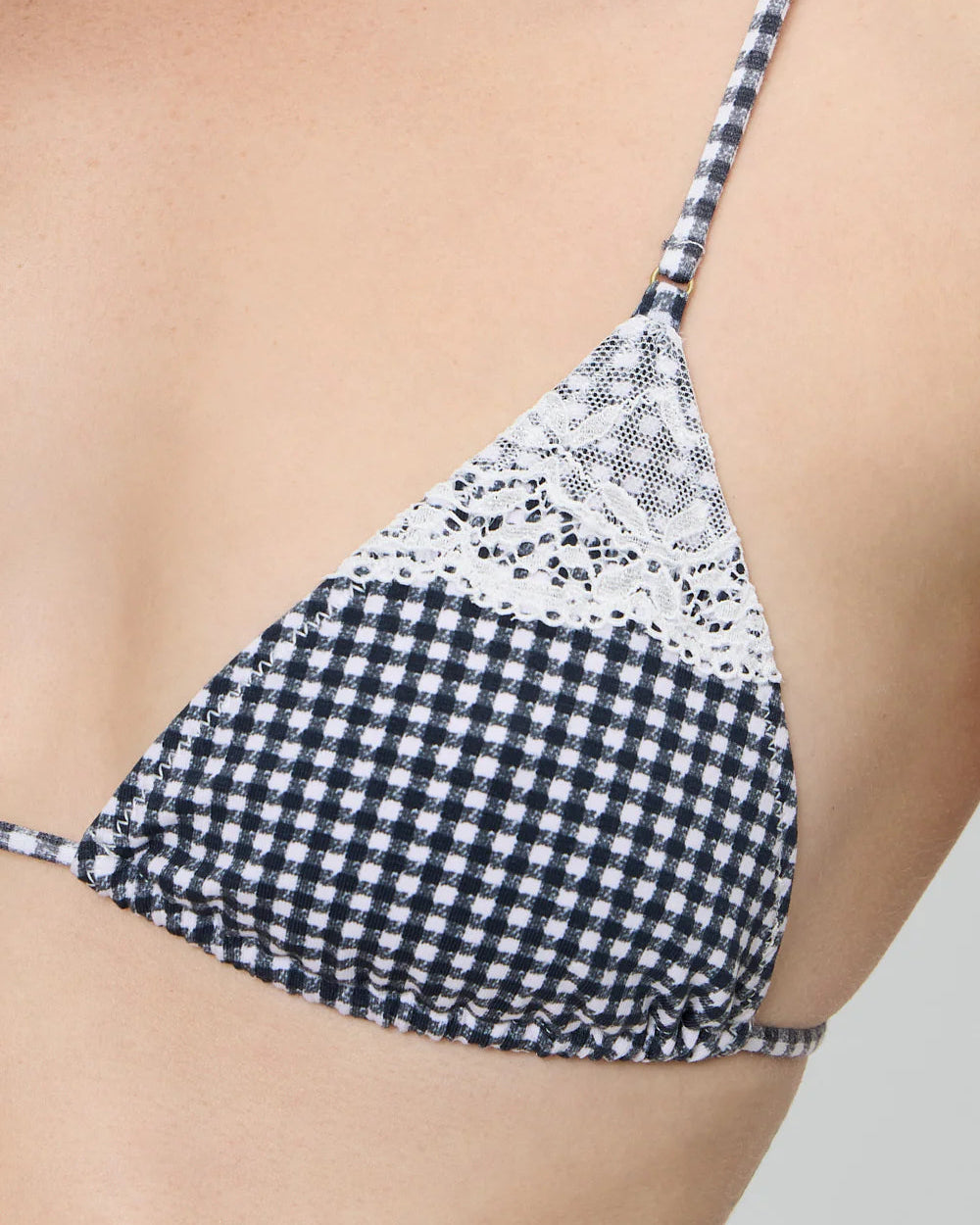 blue and white gingham bikini top with white lace on the top