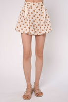 cream bubble shorts with brown polka dots