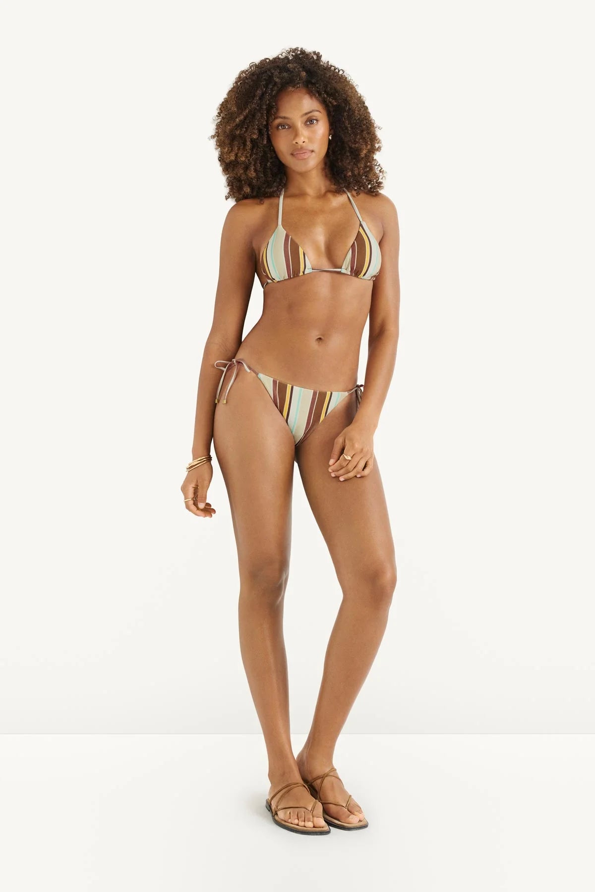 bikini bottoms with a tie on the side in a brown, blue and beige stripe
