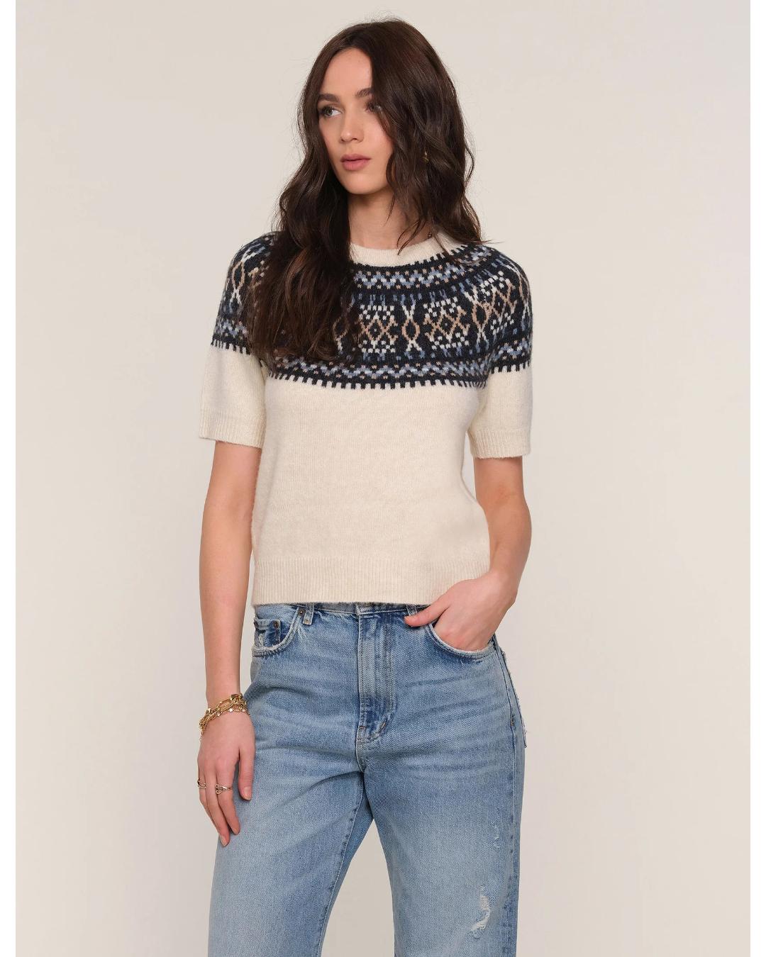 short sleeve sweater in cream with black faireisle design on the top half