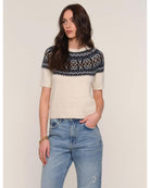 short sleeve sweater in cream with black faireisle design on the top half