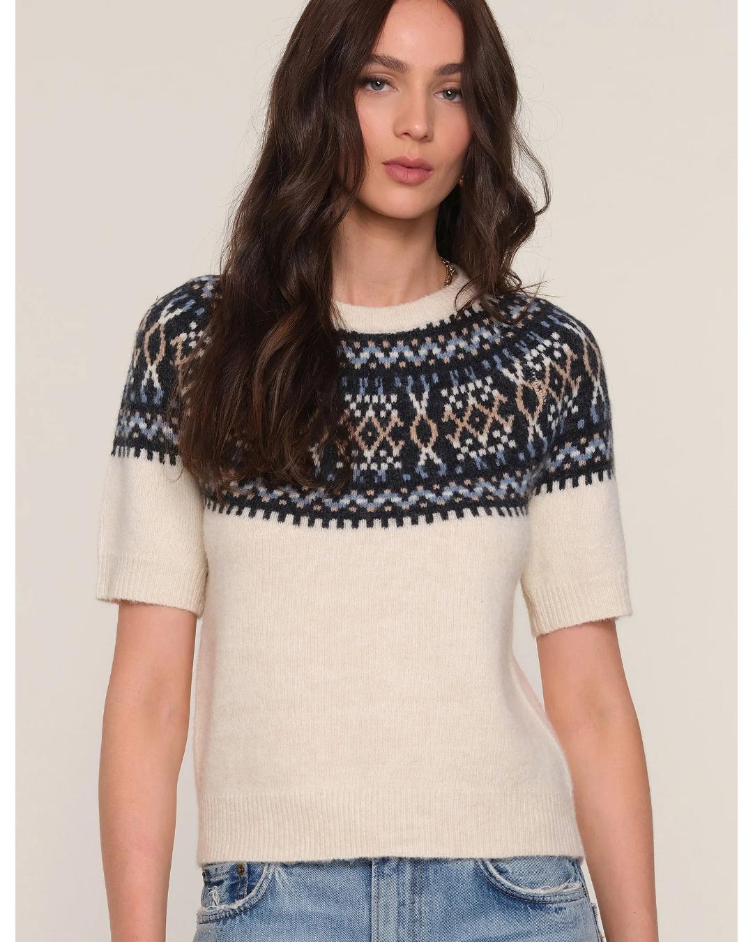 short sleeve sweater in cream with black faireisle design on the top half