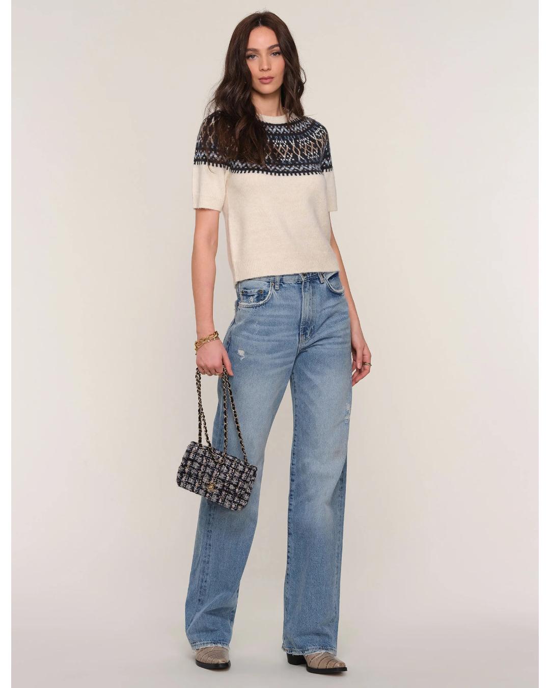 short sleeve sweater in cream with black faireisle design on the top half
