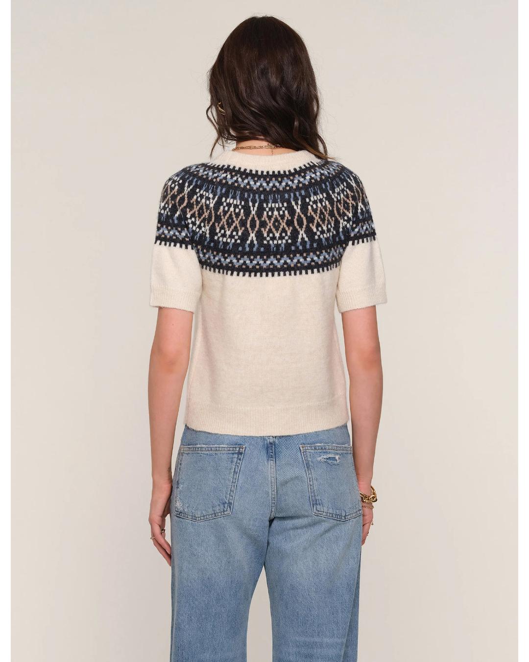short sleeve sweater in cream with black faireisle design on the top half