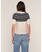 short sleeve sweater in cream with black faireisle design on the top half