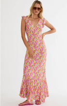 maxi dress with a pink, green and yellow floral print 