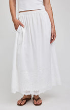midi white skirt with eyelet patterns on the bottoms