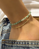 beaded bracelet in gold and green stones