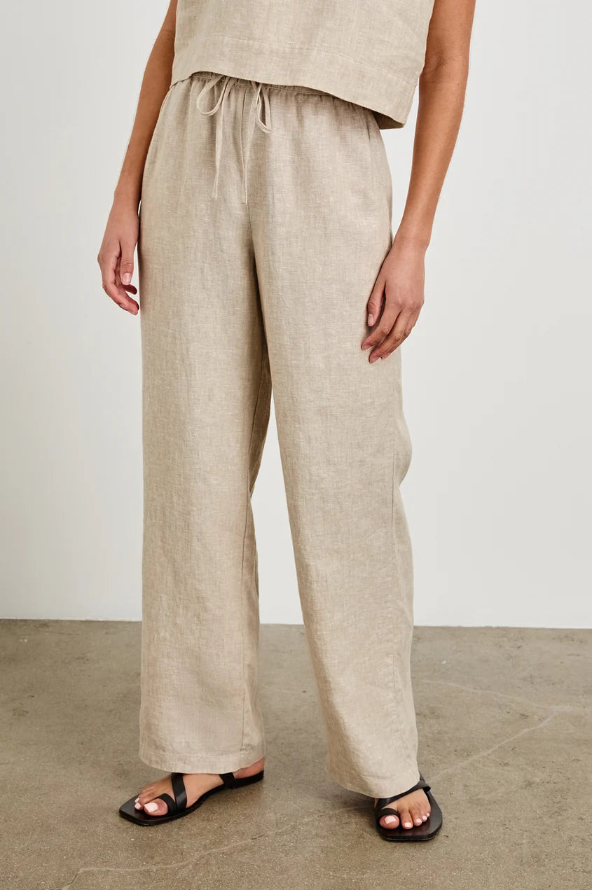 a wide leg pant in a tan colour