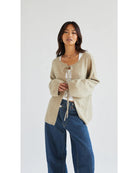 beige cardigan with two ties