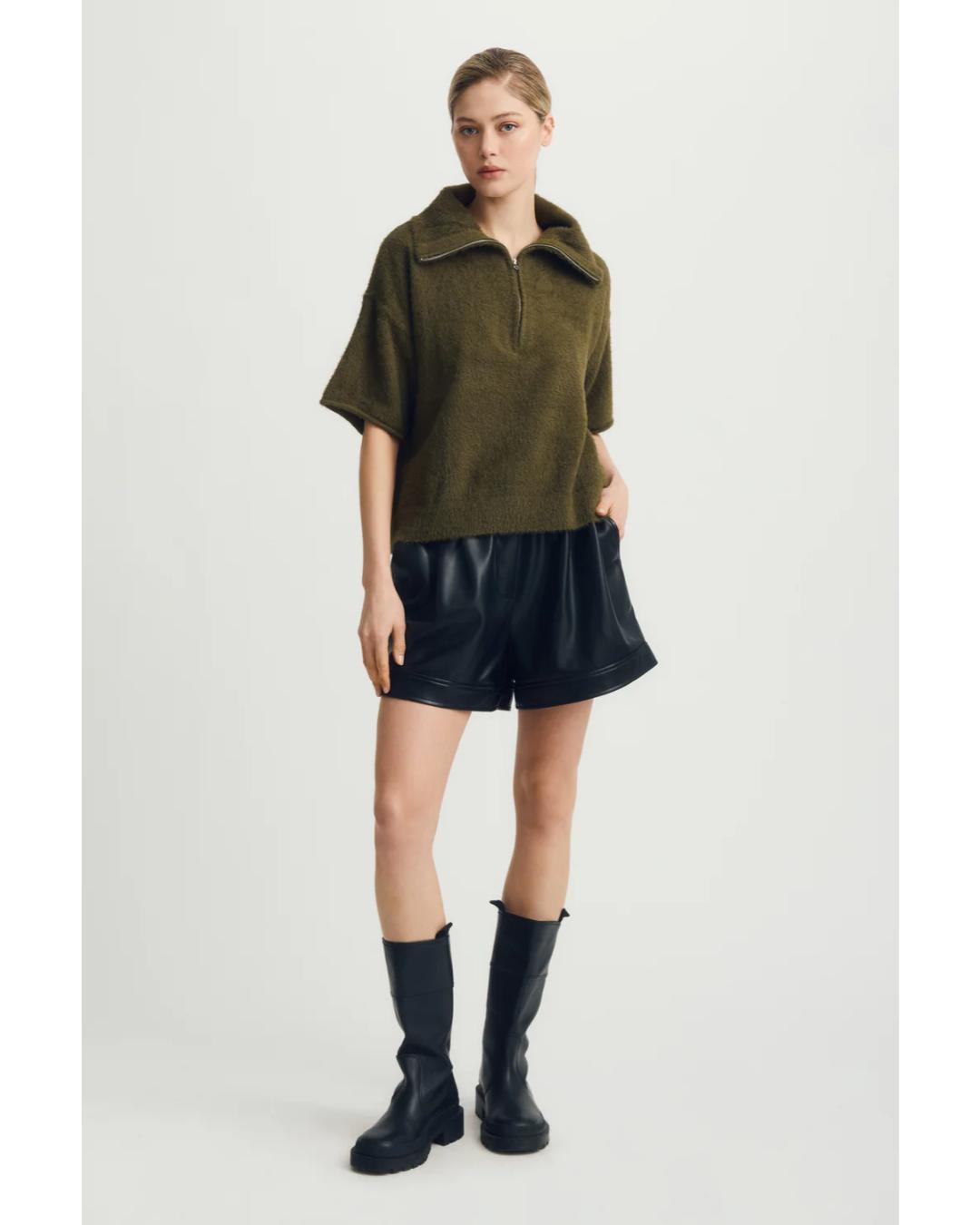 green short sleeve sweater with a half zip