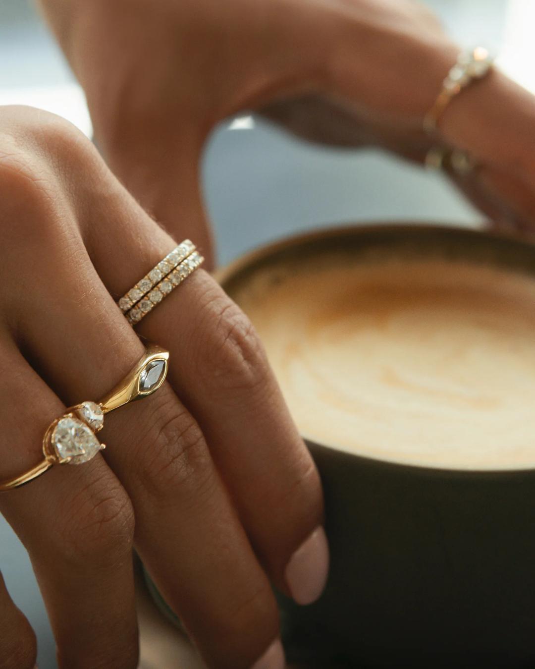 gold ring with diamonds all around