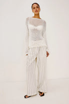 white knit long sleeve sweater