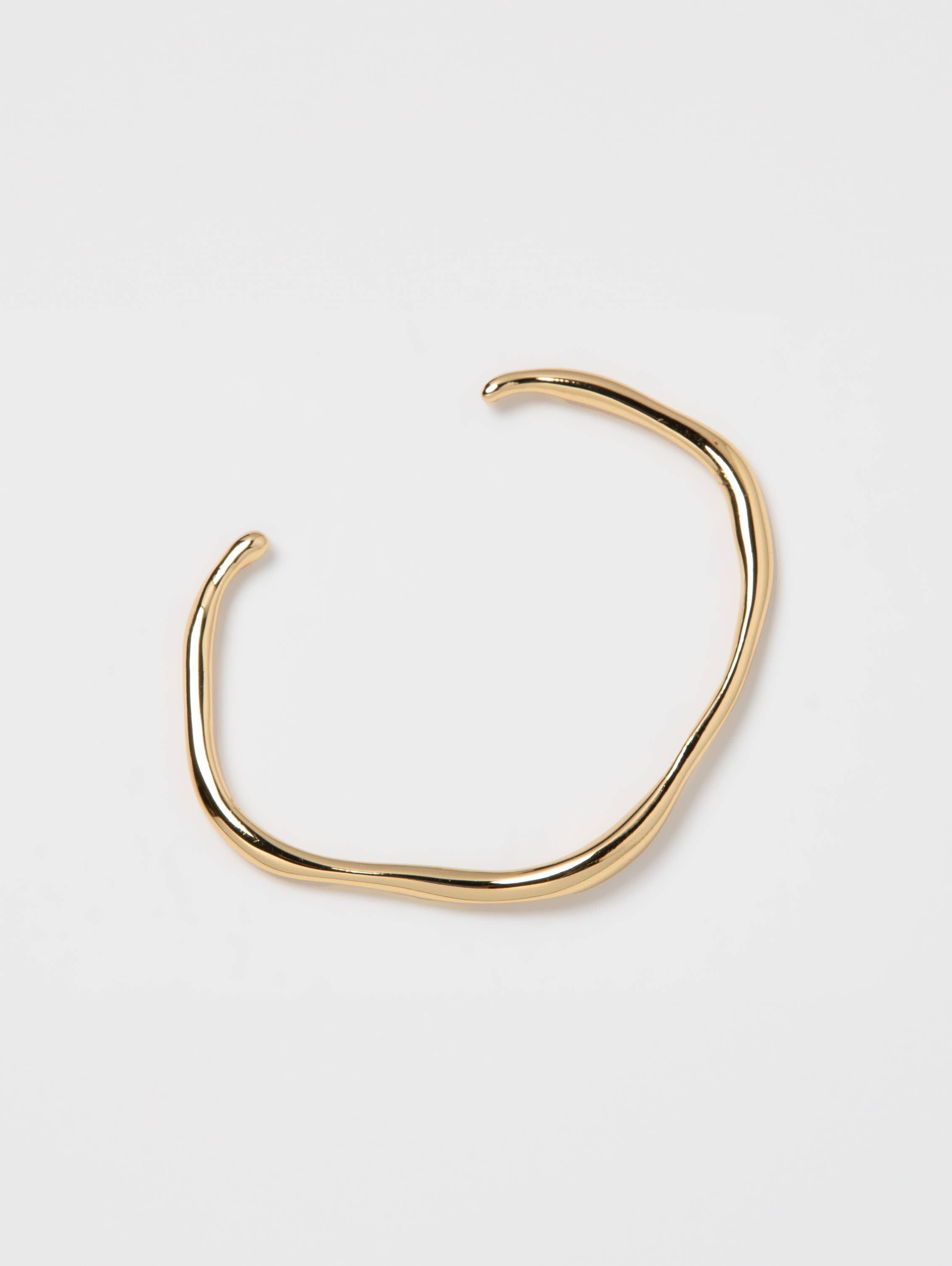 gold statement bangle