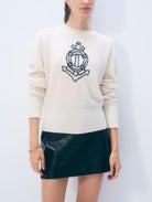 cashmere sweater in cream with a nautical design in navy