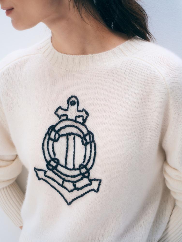 cashmere sweater in cream with a nautical design in navy