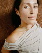 silver bean shaped necklace