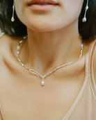 silver collar necklace with pearl drop pendant