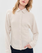 cream fitted blouse