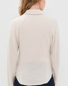 cream fitted blouse