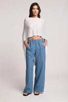 off the shoulder white draped sweater