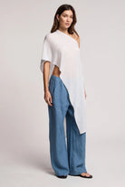 off the shoulder white draped sweater