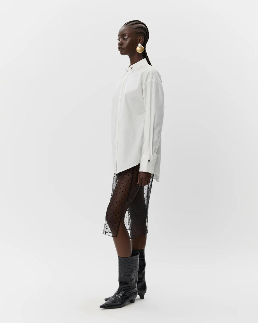 sheer black skirt with polka dots