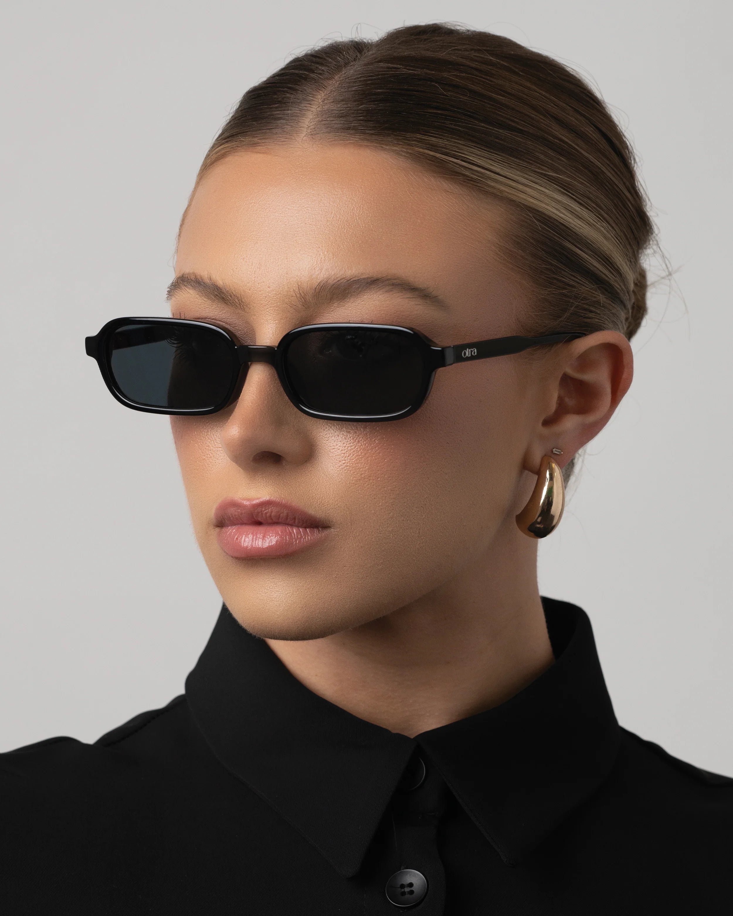 black oval sunglasses