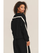 black crewneck sweatshirt with a white stripe across the back and arms