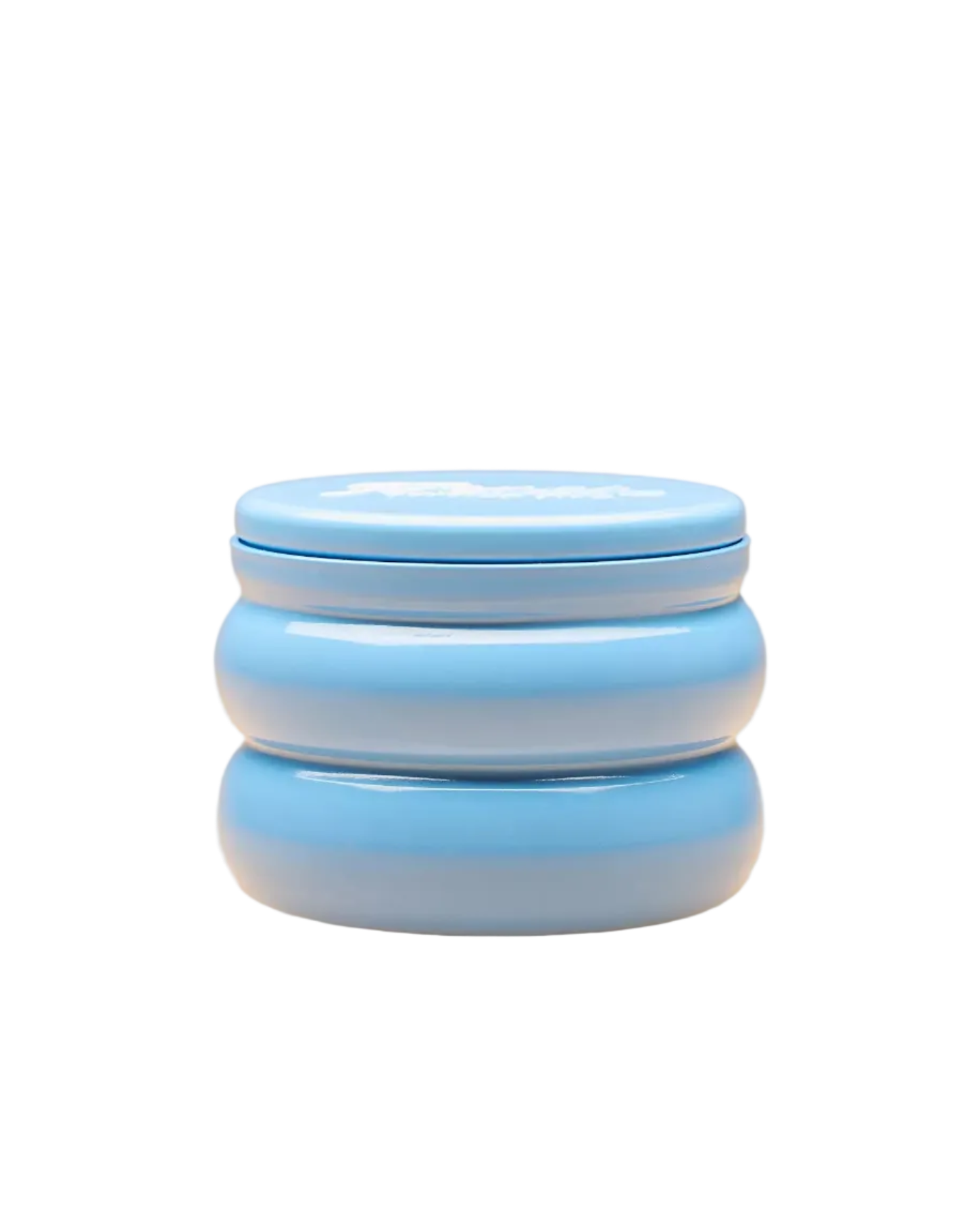 candle in blue tin