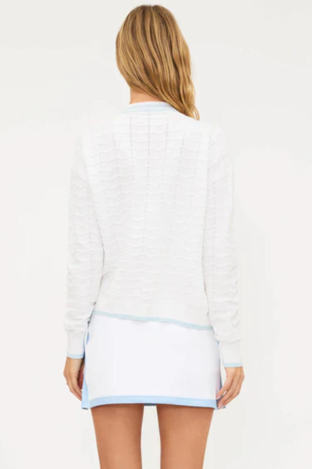 white v-neck cardigan with blue stripes down middle and pockets