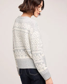 a woman wearing a cream and grey patterned fairisle sweater by gentle fawn