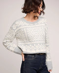 a woman wearing a cream and grey patterned fairisle sweater by gentle fawn