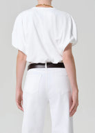 white cropped short sleeve top with a bubble waist and sleeve