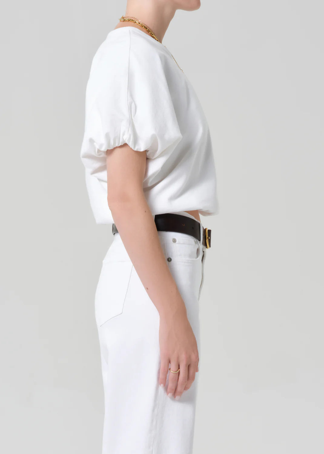 white cropped short sleeve top with a bubble waist and sleeve