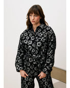 black floral blouse with a tie waist