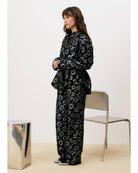 black floral blouse with a tie waist